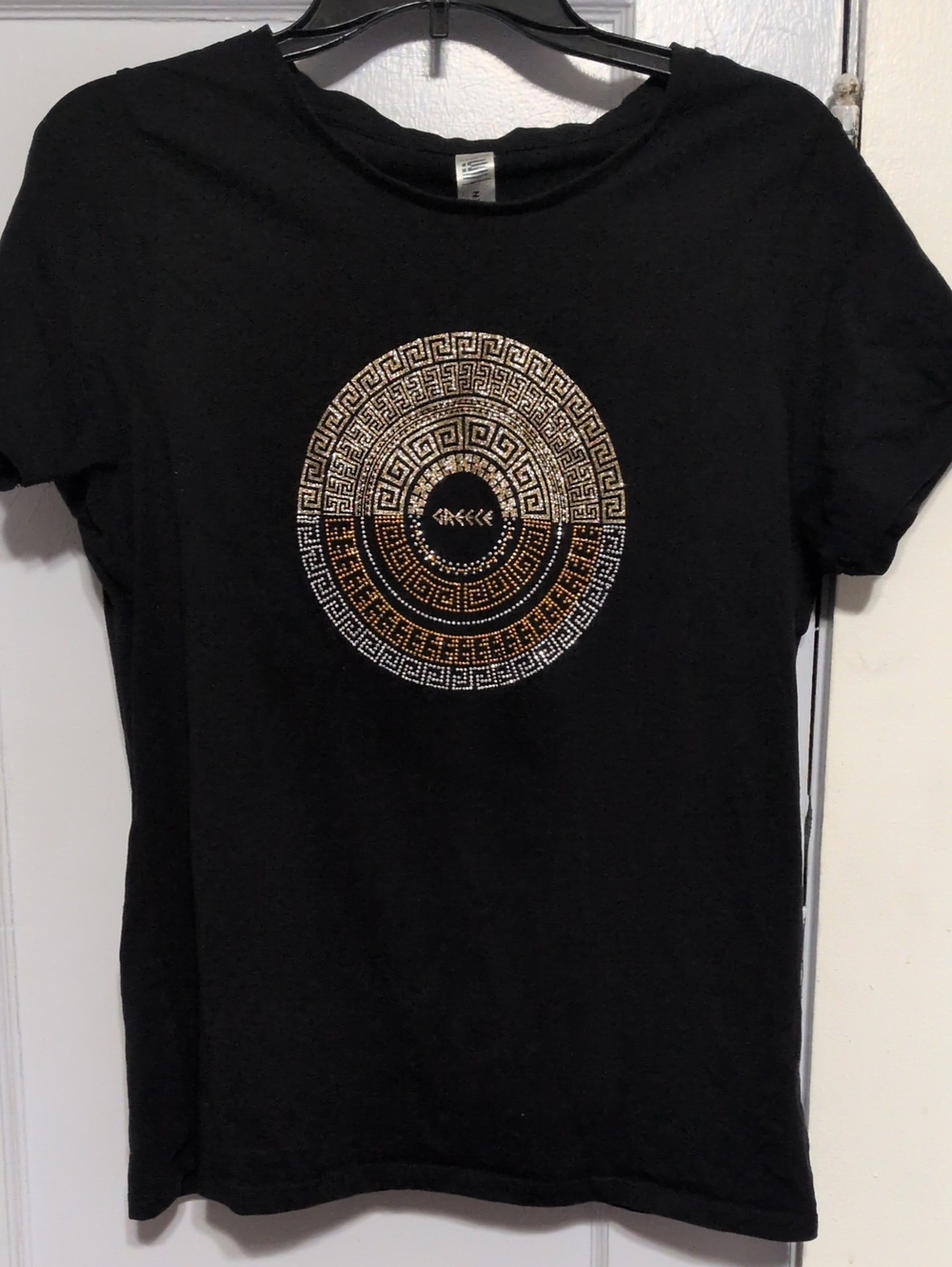 Black Graphic Tee with Metallic Medallion